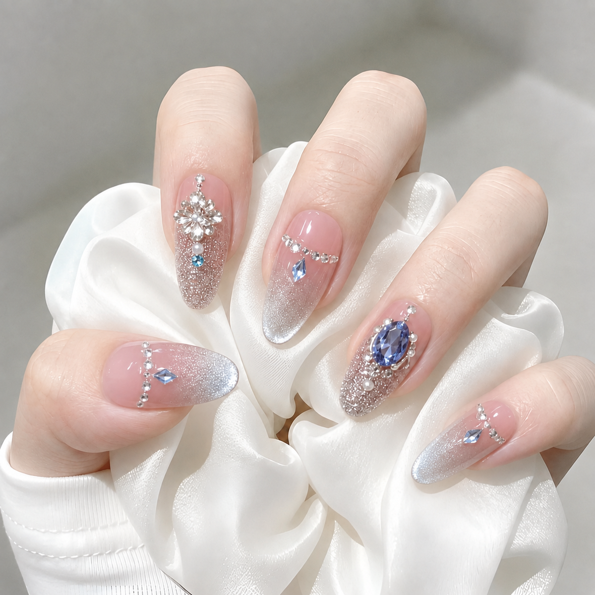 Icy Crystal Ballet Nude Pink Glitter Ombre Almond Press-On Nails with Blue Gems & Pearls