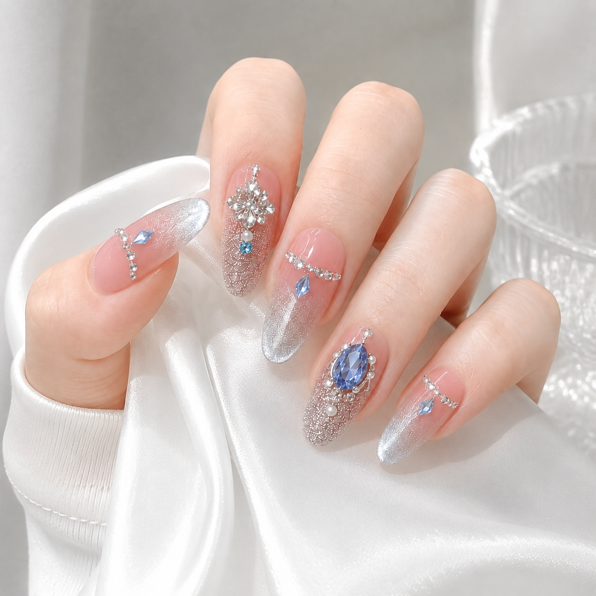 Icy Crystal Ballet Nude Pink Glitter Ombre Almond Press-On Nails with Blue Gems & Pearls